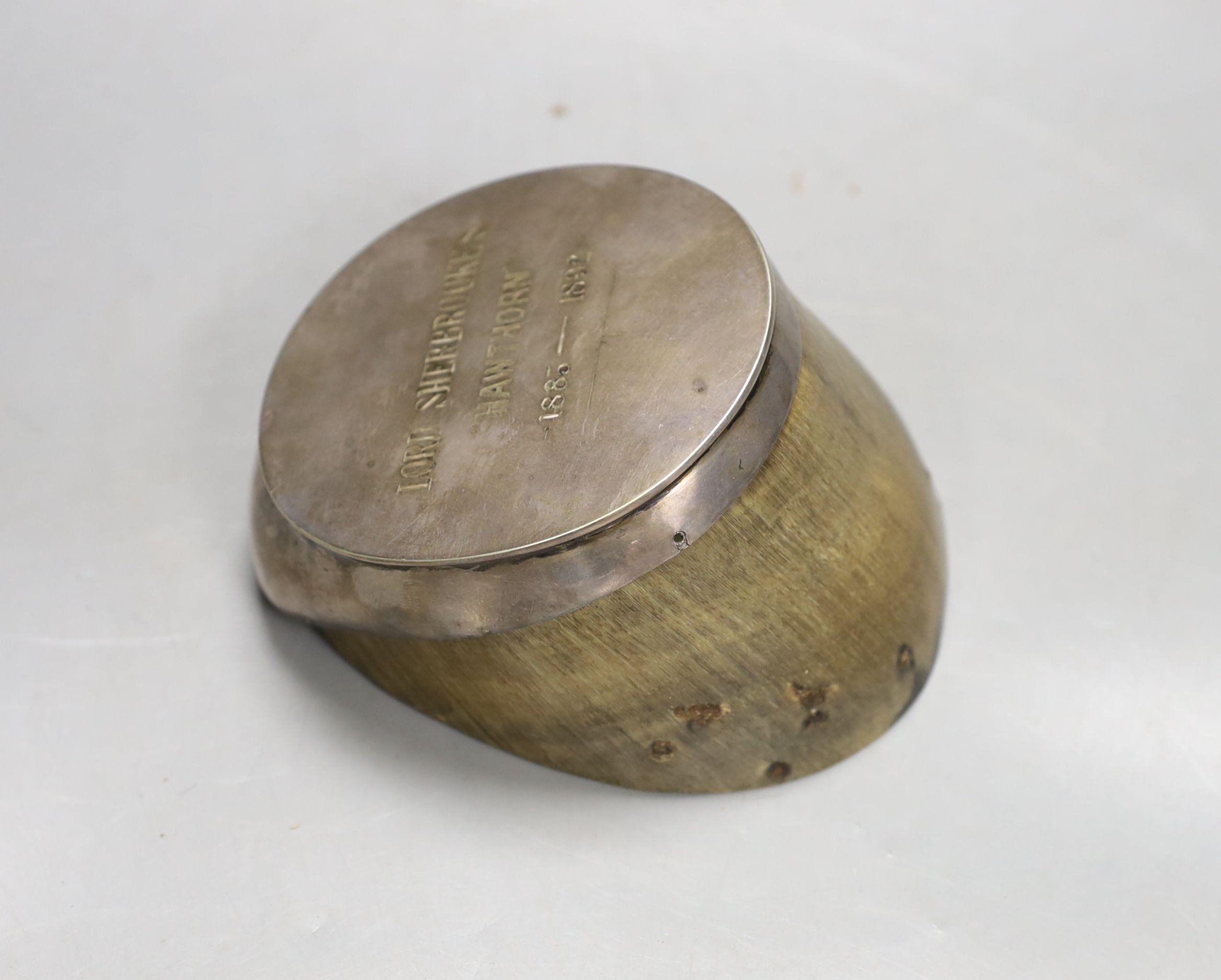 A Victorian horse’s hoof desk weight, electroplated mount inscribed, ‘Lord Sherbrooke’s Hawthorne, 1885-1892’, 8 cms high.